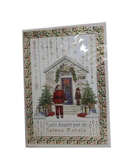 Biglietto natalizio con casa di Babbo Natale